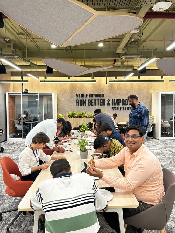 SAP Labs volunteers on a hands-on activity with children