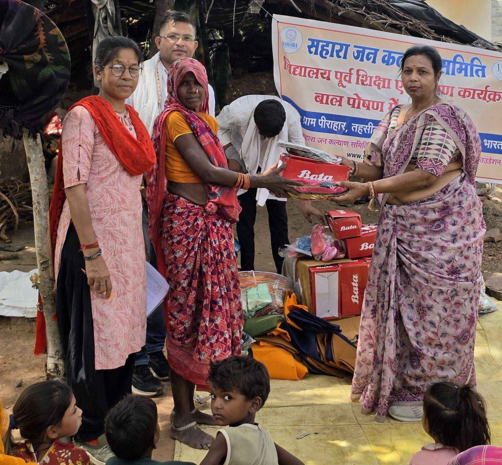 A nutrition kit handed to a mother at the pre-school education and child-nutrition programme