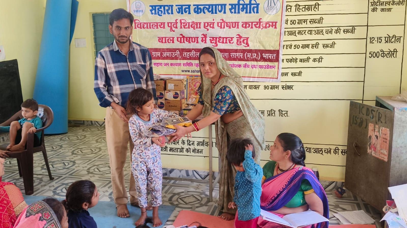 A nutrition kit handed to a family at a Sahara centre