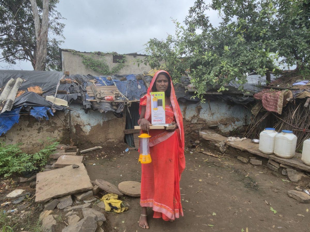 In a low-lying, flood-prone hamlet, a woman managing her household received a solar lantern.